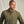 Load image into Gallery viewer, Man wearing a green shirt against a beige background