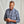 Load image into Gallery viewer, Man wearing a gray checkered shirt against a plain background