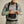 Load image into Gallery viewer, man closing zipper on waders