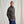 Load image into Gallery viewer, Man wearing a gray pullover with a blue zipper against a plain background