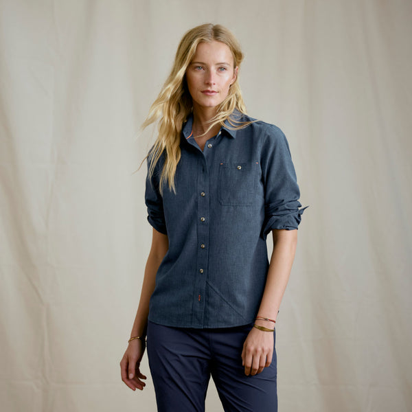 woman modelling dark blue shirt and pants