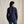 Load image into Gallery viewer, Person wearing a dark blue patterned shirt against a beige background