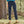 Load image into Gallery viewer, woman wearing dark blue pants