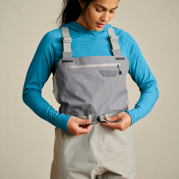 woman adjusting wader