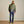 Load image into Gallery viewer, man wearing green waterproof jacket and blue pants and wading boots