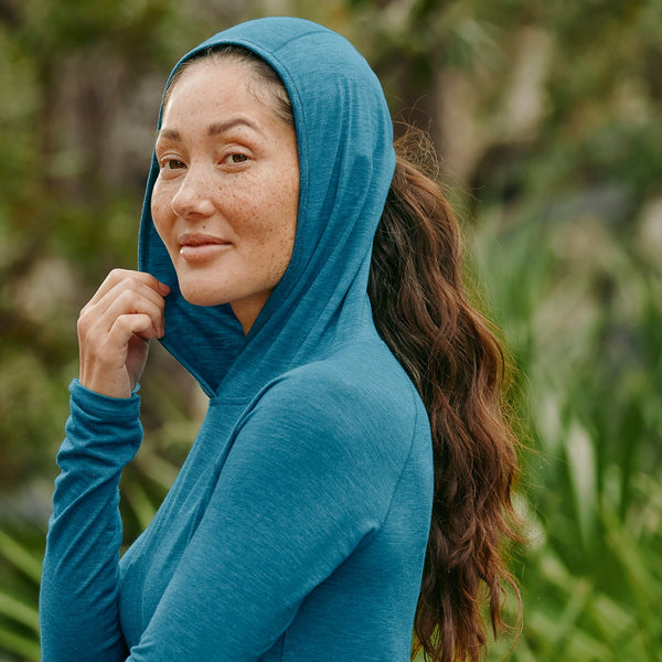 woman wearing dark blue hoodie