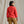 Load image into Gallery viewer, woman modelling red sweaster and beige pants