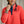 Load image into Gallery viewer, closeup of woman wearing red sweater
