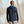 Load image into Gallery viewer, man with his back to the camera wearing dark blue hoodie