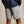 Load image into Gallery viewer, man facing away from camera wearing grey shorts