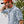 Load image into Gallery viewer, man smiling wearing orange cap and blue and white shirt