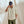 Load image into Gallery viewer, man in dark green shorts, orange checkered shirt and Orvis cap