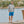 Load image into Gallery viewer, man by the water wearing blue shorts and grey turtleneck sweater