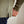 Load image into Gallery viewer, Person wearing a green long-sleeve shirt with a pocket detail on a blurred background