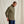 Load image into Gallery viewer, Man wearing a green pullover against a beige background
