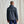 Load image into Gallery viewer, Person wearing a dark grey raincoat on a plain background