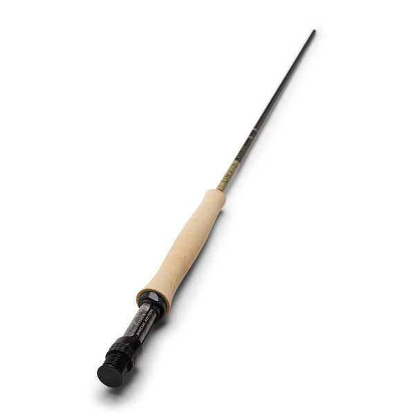 Fishing rod with beige handle and black components on a white background