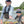 Load image into Gallery viewer, two kids showing trout to the camera