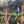 Load image into Gallery viewer, man fly fishing from the side of the river