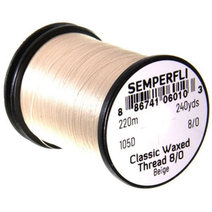 A spool of Semperfli Classic Waxed Thread, beige in color, labeled with the thread size and other details.
