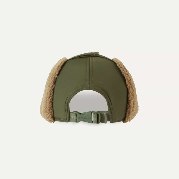 Green cap with brown ear flaps on a light gray background