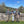 Load image into Gallery viewer, two men and one woman fly fishers on bridge