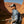 Load image into Gallery viewer, Side view of a man wearing fishing gear in the mountains, in the sunshine, smiling