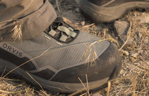 closeup of orvis wading boots