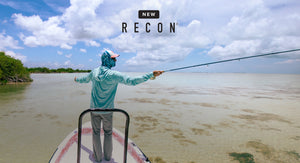 man fishing from boat with text on image New Recon