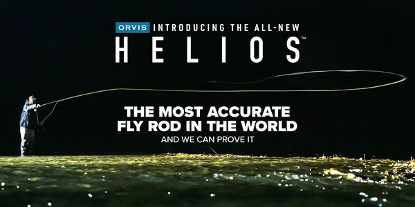 Introducing the all-new Helios. The most accurate fly rod in the world. And we can prove it.  A dramatic image of an angler casting a fly line at night.