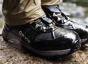 closeup of Orvis wading shoes