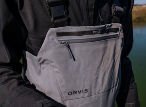 Close up of grey Orvis waders