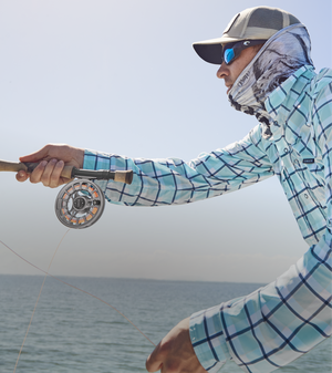 closeup of man fly fishing