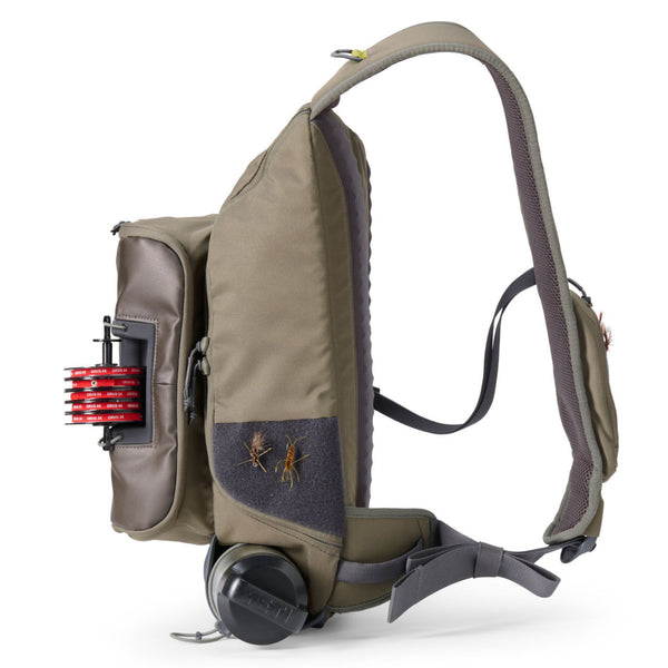 side of dark green fishing backpack