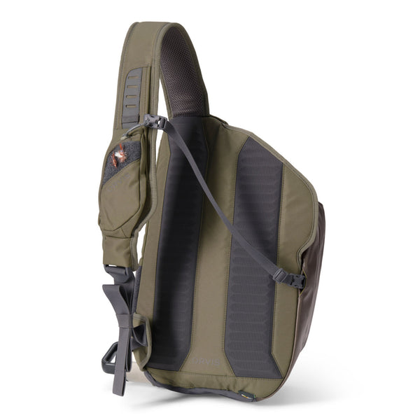 backside of dark green fishing backpack