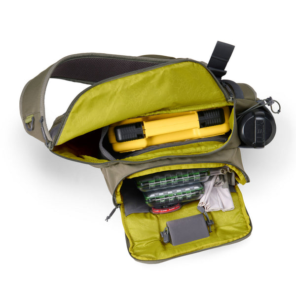 display of inside a grey fishing backpack