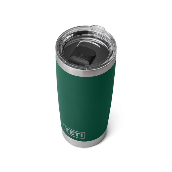 Green YETI tumbler with a clear lid on a white background