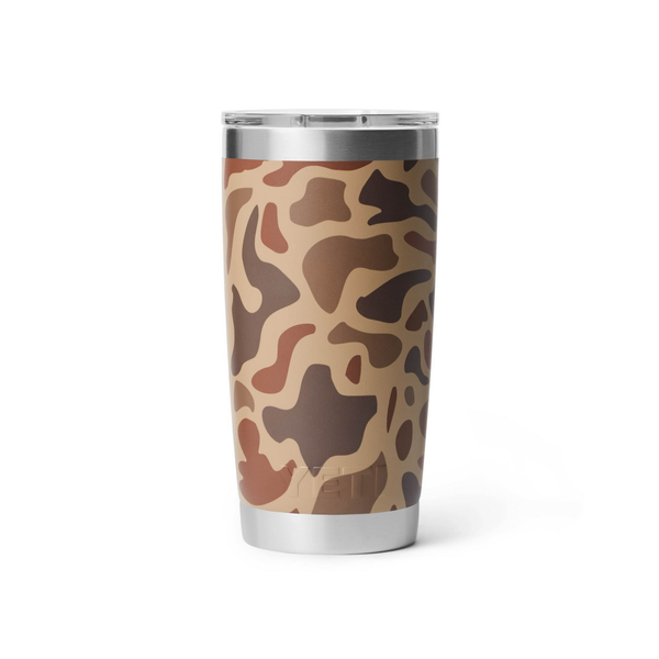 Camouflage-patterned Yeti tumbler with a silver rim on a white background