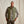 Load image into Gallery viewer, man wearing brown pants, shirt and green vest in front of beige background
