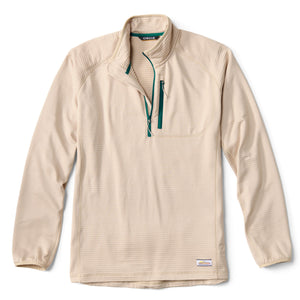 Beige sweater with dark green zipper details