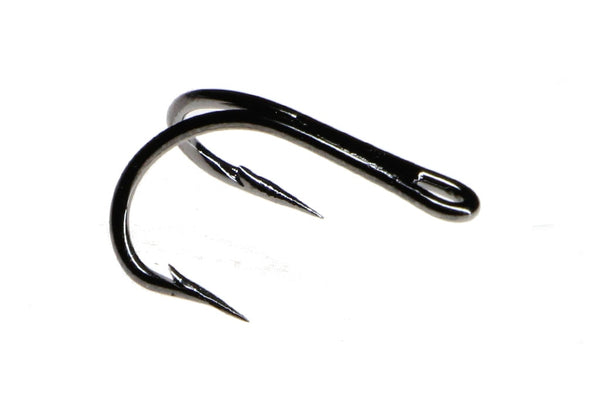 two fly fishing hooks on white background