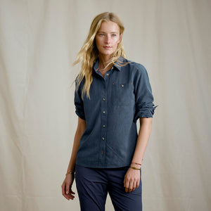 woman modelling dark blue shirt and pants