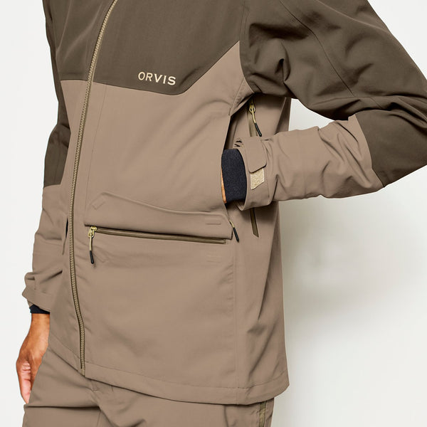 closeup of man wearing brown and beige jacket from Orvis