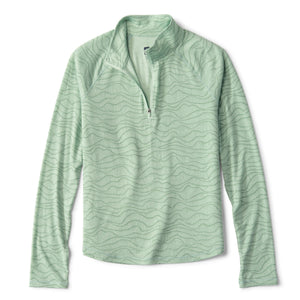 Light green long-sleeve shirt with a subtle pattern on a white background