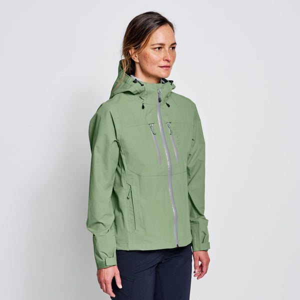 woman wearing lime green waterproof jacket from orvis