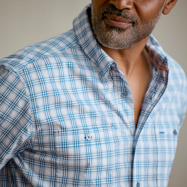 Close up of man modelling blue and white striped shirt