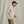 Load image into Gallery viewer, Man wearing blue cap, beige and white checkered shirt and military green pants in front of beige background
