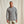 Load image into Gallery viewer, Man wearing a camouflage hoodie against a plain background
