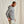 Load image into Gallery viewer, Man wearing a gray camouflage hoodie and beige pants against a plain background
