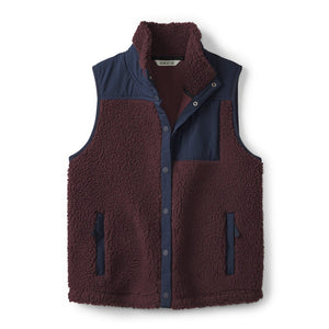 brown vest with dark blue details